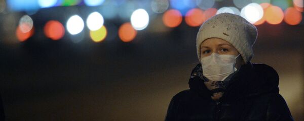 В защитной маске - Sputnik Латвия