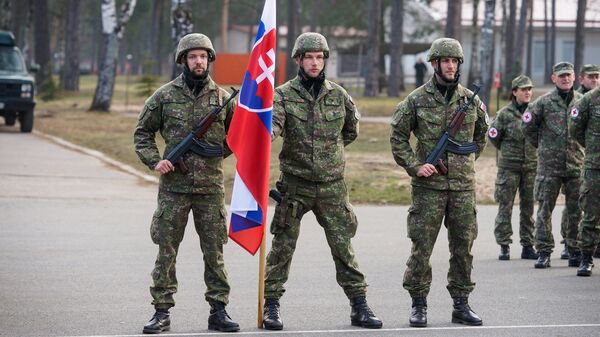 Словацкие военнослужащие на военной базе в Адажи Словацкие военнослужащие на военной базе в Адажи - Sputnik Латвия