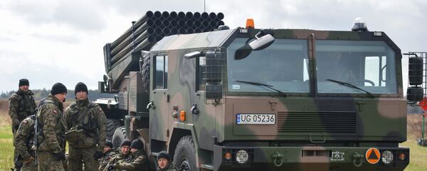 Система залпового огня на церемонии приветствия многонационального батальона НАТО под руководством США в польском Ожише Система залпового огня на церемонии приветствия многонационального батальона НАТО под руководством США в польском Ожише - Sputnik Latvija