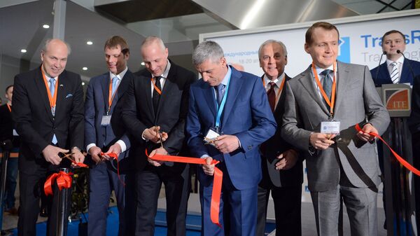 Каспарс Озолиньш на официальном открытии выставки в рамках 22-й Международной конференции для грузовладельцев, логистов и перевозчиков ТрансРоссия - Sputnik Латвия