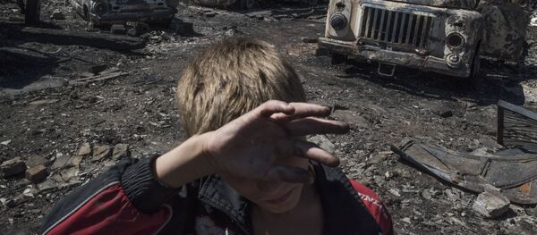 Apšaudes sekas Doņeckas apgabalā. Foto no arhīva - Sputnik Latvija