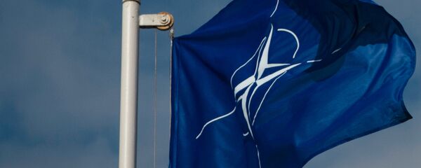 Флаг Организации Североатлантического договора (НАТО) Флаг Организации Североатлантического договора (НАТО) - Sputnik Latvija