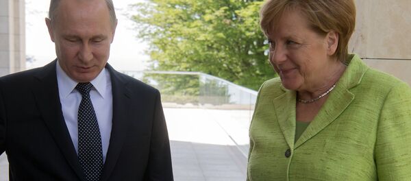 Krievijas prezidents Vladimirs Putins un Vācijas kanclere Angela Merkele Krievijas prezidents Vladimirs Putins un Vācijas kanclere Angela Merkele - Sputnik Latvija
