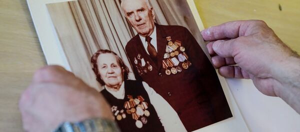 Подготовка к акции Бессмертный полк в Риге Подготовка к акции Бессмертный полк в Риге - Sputnik Latvija