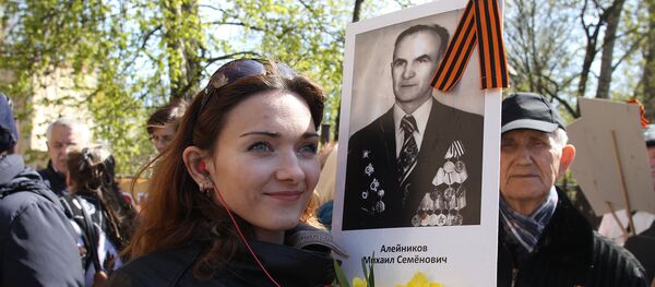 Nemirstīgā pulka gājiens Rīgā 2017. gada 9. maijā Nemirstīgā pulka gājiens Rīgā 2017. gada 9. maijā - Sputnik Latvija