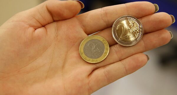 Литовский лит и евро, архивное фото - Sputnik Латвия