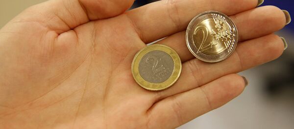 Литовский лит и евро, архивное фото - Sputnik Latvija