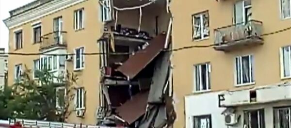 Видео с места обрушения перекрытий четырехэтажного дома в Волгограде - Sputnik Латвия