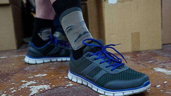 Современные технологии позволяют наносить фотографию на носки - Sputnik Латвия