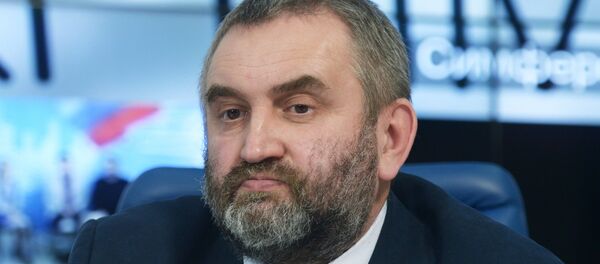 Доцент кафедры истории южных и западных славян Исторического факультета МГУ Юрий Борисенок - Sputnik Латвия