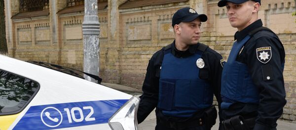 Сотрудники Украинской полиции в Киеве, архивное фото Сотрудники Украинской полиции в Киеве, архивное фото - Sputnik Latvija