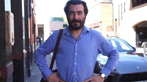 Олег Хилл на лондонской улице Олег Хилл на лондонской улице - Sputnik Латвия