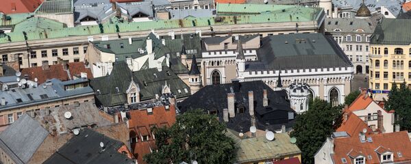 Крыши старого города в Риге в Латвии Крыши старого города в Риге в Латвии - Sputnik Latvija