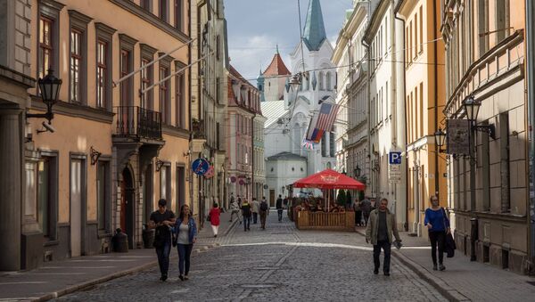 Улица Пилс и Церковь Скорбящей Богоматери в Риге в Латвии - Sputnik Латвия