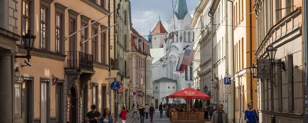 Pils iela un Rīgas Sāpju Dievmātes baznīca Pils iela un Rīgas Sāpju Dievmātes baznīca - Sputnik Latvija