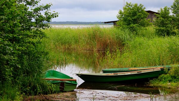 Лодки на берегу озера - Sputnik Латвия