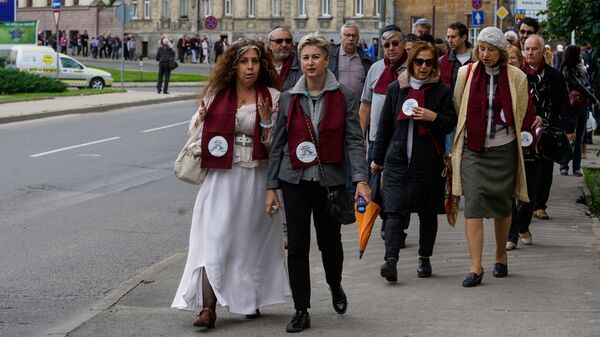 Марш живых прошёл по улицам, где в годы войны было гетто - Sputnik Латвия