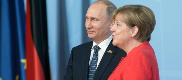 Президент РФ Владимир Путин и канцлер Германии Ангела Меркель Президент РФ Владимир Путин и канцлер Германии Ангела Меркель - Sputnik Latvija