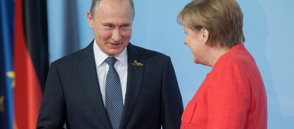 Президент РФ Владимир Путин и канцлер Германии Ангела Меркель - Sputnik Латвия