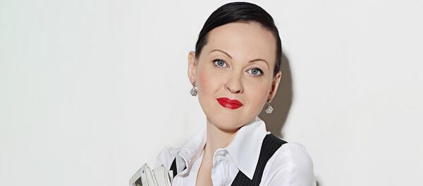 Ольга Князева - экономист, редактор русскоязычного портала Dienas Bizness - Sputnik Латвия