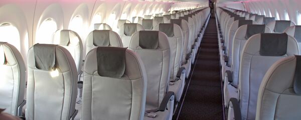 Салон самолета аirBaltic Bombardier CS300 в аэропорту Рига Салон самолета аirBaltic Bombardier CS300 в аэропорту Рига - Sputnik Latvija