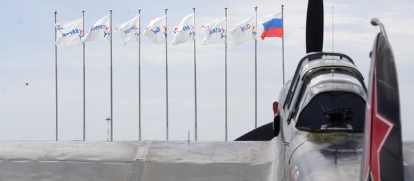 Самолет ИЛ-2 (1942 г.) на полигоне во время подготовки к открытию Международного авиационно-космического салона МАКС-2017 в Жуковском. Самолет ИЛ-2 (1942 г.) на полигоне во время подготовки к открытию Международного авиационно-космического салона МАКС-2017 в Жуковском. - Sputnik Латвия