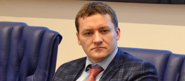 Белорусский экономист Дмитрий Болкунец Белорусский экономист Дмитрий Болкунец - Sputnik Латвия