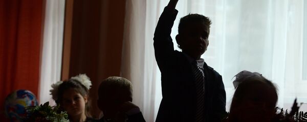 Первоклассники на первом уроке Первоклассники на первом уроке - Sputnik Latvija