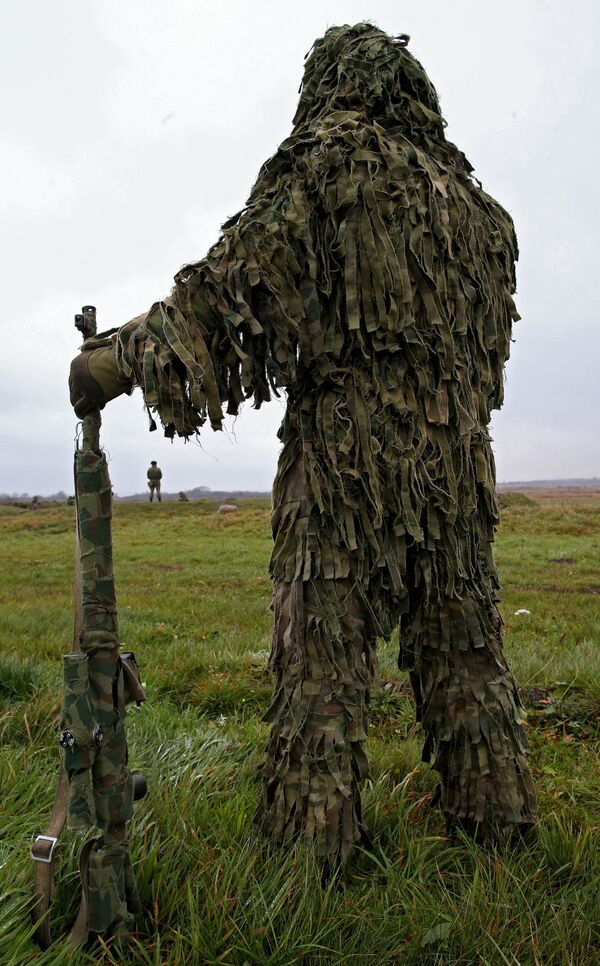 Военнослужащий на учениях морских пехотинцев береговых войск Балтийского флота в Калининградской области - Sputnik Латвия