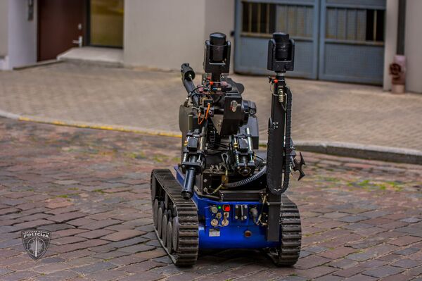 Полиция провела учения по освобождению заложников в центре Риги Полиция провела учения по освобождению заложников в центре Риги - Sputnik Латвия