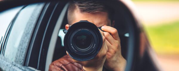 Шпион с фотоаппаратом Шпион с фотоаппаратом - Sputnik Latvija
