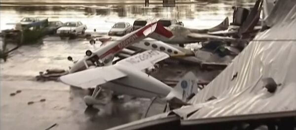 Spēcīga vētra ASV izmētājusi lidmašīnas kā skaidiņas - Sputnik Latvija