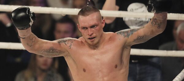 Украинский боксер-профессионал Александр Усик - Sputnik Латвия