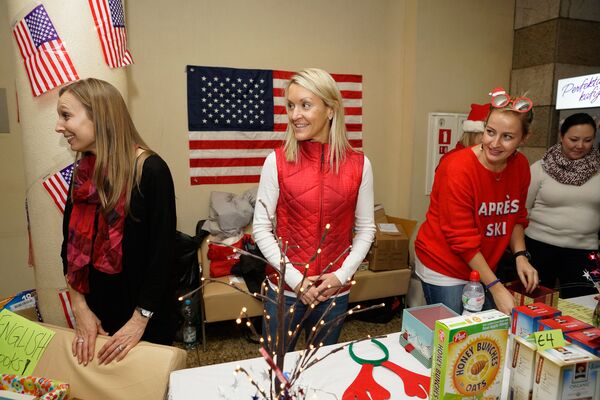 На стенде посольства США На стенде посольства США - Sputnik Латвия