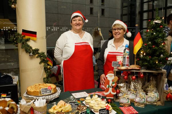 На стенде посольства Германии На стенде посольства Германии - Sputnik Латвия