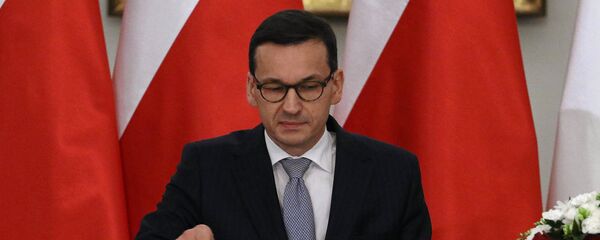 Polijas premjerministrs Mateušs Moraveckis Polijas premjerministrs Mateušs Moraveckis - Sputnik Latvija