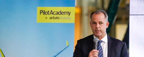 Председатель правления авиакомпании airBaltic Мартин Гаусс Председатель правления авиакомпании airBaltic Мартин Гаусс - Sputnik Latvija