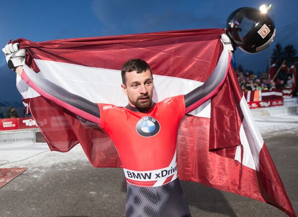 Золотой медалист Мартинс Дукурс на чемпионате мира по скелетону в австрийском Иглсе - Sputnik Латвия