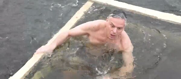 Крещенское купание посла США в РФ Крещенское купание посла США в РФ - Sputnik Latvija