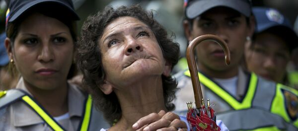 Женщины-полицейские охраняют общественный порядок во время демонстрации  в Каракасе, Венесуэла Женщины-полицейские охраняют общественный порядок во время демонстрации  в Каракасе, Венесуэла - Sputnik Latvija