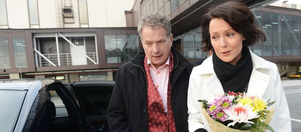Президент Финляндии Саули Нийнисте с супругой Енни Хаукио - Sputnik Латвия