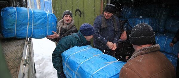 Военные Латвии и Национальной гвардии Украины доставили в Донбасс гуманитарную помощь - Sputnik Латвия