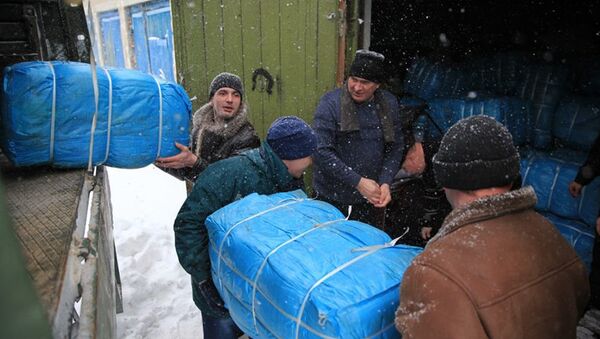Военные Латвии и Национальной гвардии Украины доставили в Донбасс гуманитарную помощь - Sputnik Латвия