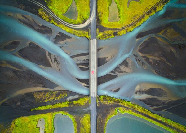 Снимок Patterns of Glacial River индийского фотографа Manish Mamtani из категории Travel (Open competition), вошедший в шортлист фотоконкурса 2018 Sony World Photography Awards - Sputnik Латвия