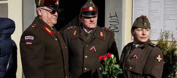 Gatavošanās SS leģionāru gājienam Rīgā Gatavošanās SS leģionāru gājienam Rīgā - Sputnik Latvija