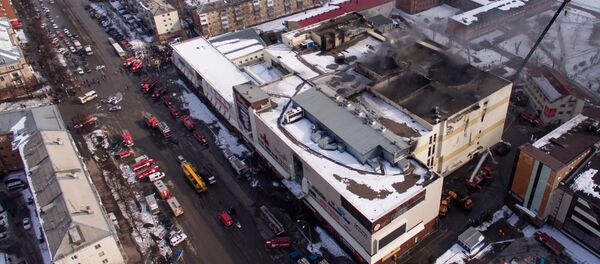 Последствия пожара в ТЦ Зимняя вишня Последствия пожара в ТЦ Зимняя вишня - Sputnik Латвия