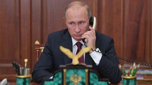 Президент РФ В. Путин провел телефонный разговор с главами ДНР А. Захарченко и ЛНР И. Плотницким - Sputnik Latvija