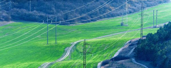 Elektrības pārvades līnijas Kļinovkas ciematā, Krima Elektrības pārvades līnijas Kļinovkas ciematā, Krima - Sputnik Latvija