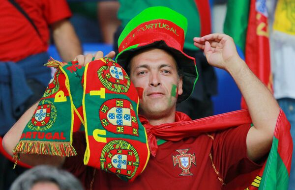 Португальские болельщики ждут от своей команды повторения чуда – после покорившегося чемпионата Европы им нужен Кубок мира.  - Sputnik Латвия