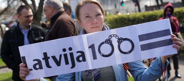 Пикет у здания Полиции безопасности против ареста Александра Гапоненко Пикет у здания Полиции безопасности против ареста Александра Гапоненко - Sputnik Latvija